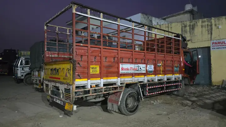 Goods carrier truck parked at the Shimla Manali Goods Carrier depot
