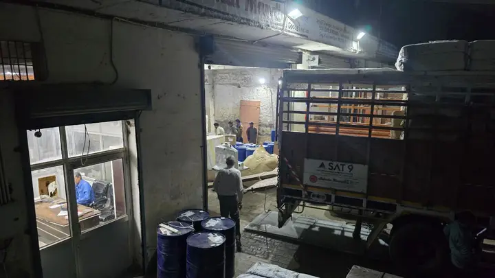 Night-time loading of goods at the Shimla Manali Goods Carrier depot for early dispatch