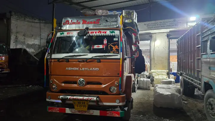 Ashok Leyland goods carrier truck with Shimla Manali Goods Carrier branding at the depot